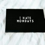 black i hate Mondays printed box on white textile